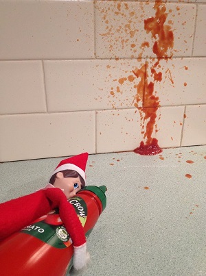 cheeky elf using the sauce