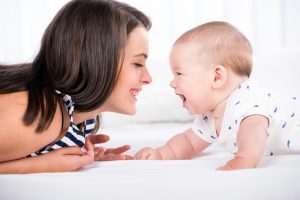 parents helping baby development