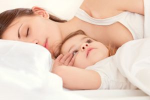 sleeping 11 month old with mother