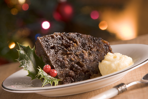 Portion of Christmas Pudding with Brandy Butter