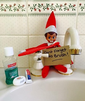 elf reminding kids to brush